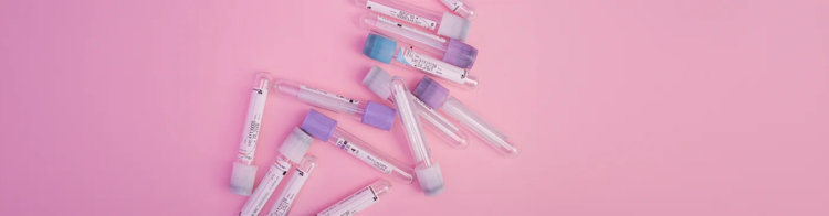 Vials of biological material to be transported, representing temperature‑sensitive healthcare shipments requiring controlled transport.
